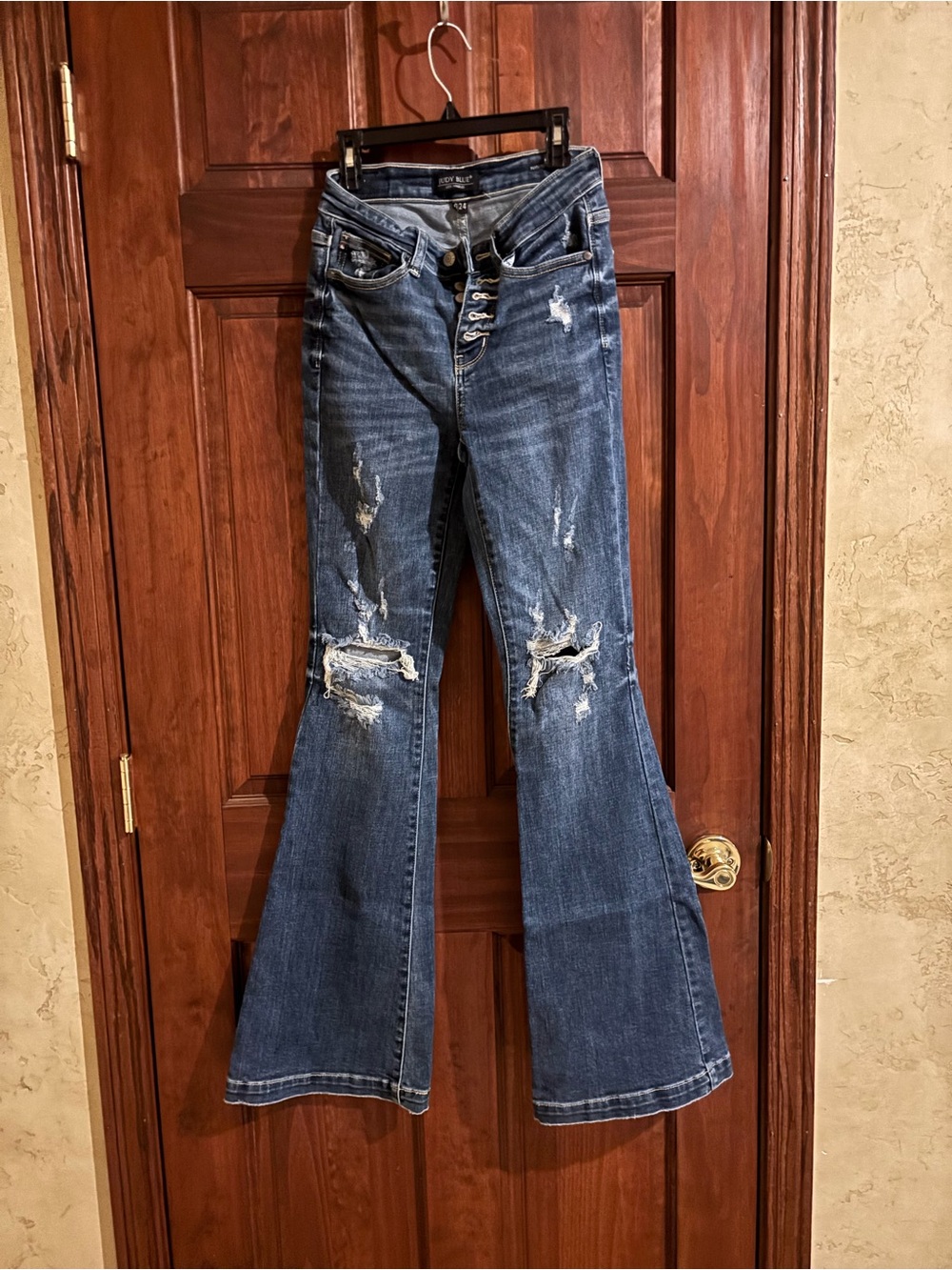 Judy Blue Distressed High-Rise Flared Jeans in Washed Blue
